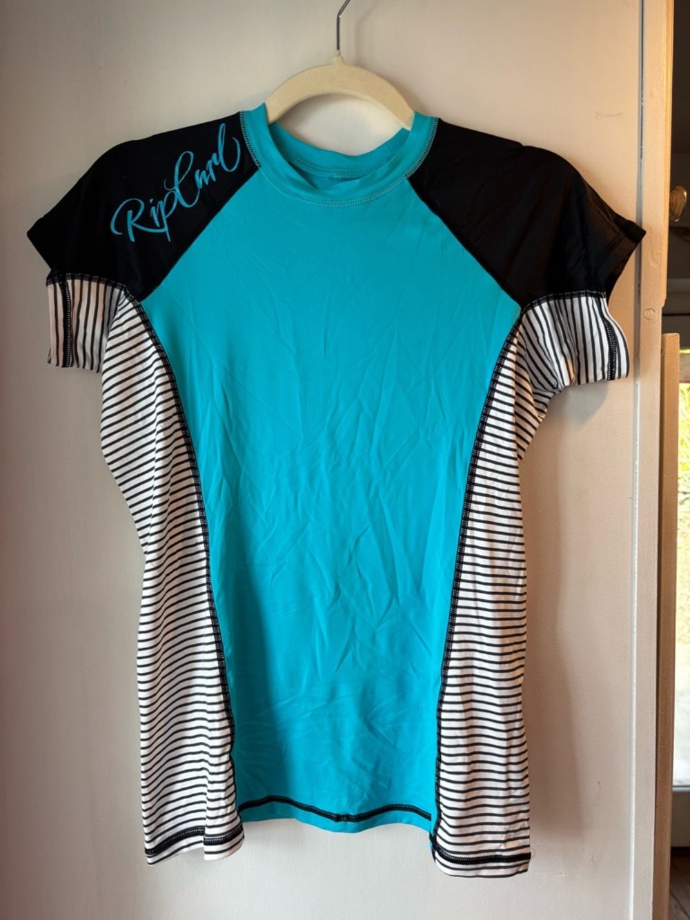 Rip Curl Turquoise and Black Short-Sleeve Rashguard with Striped Sides